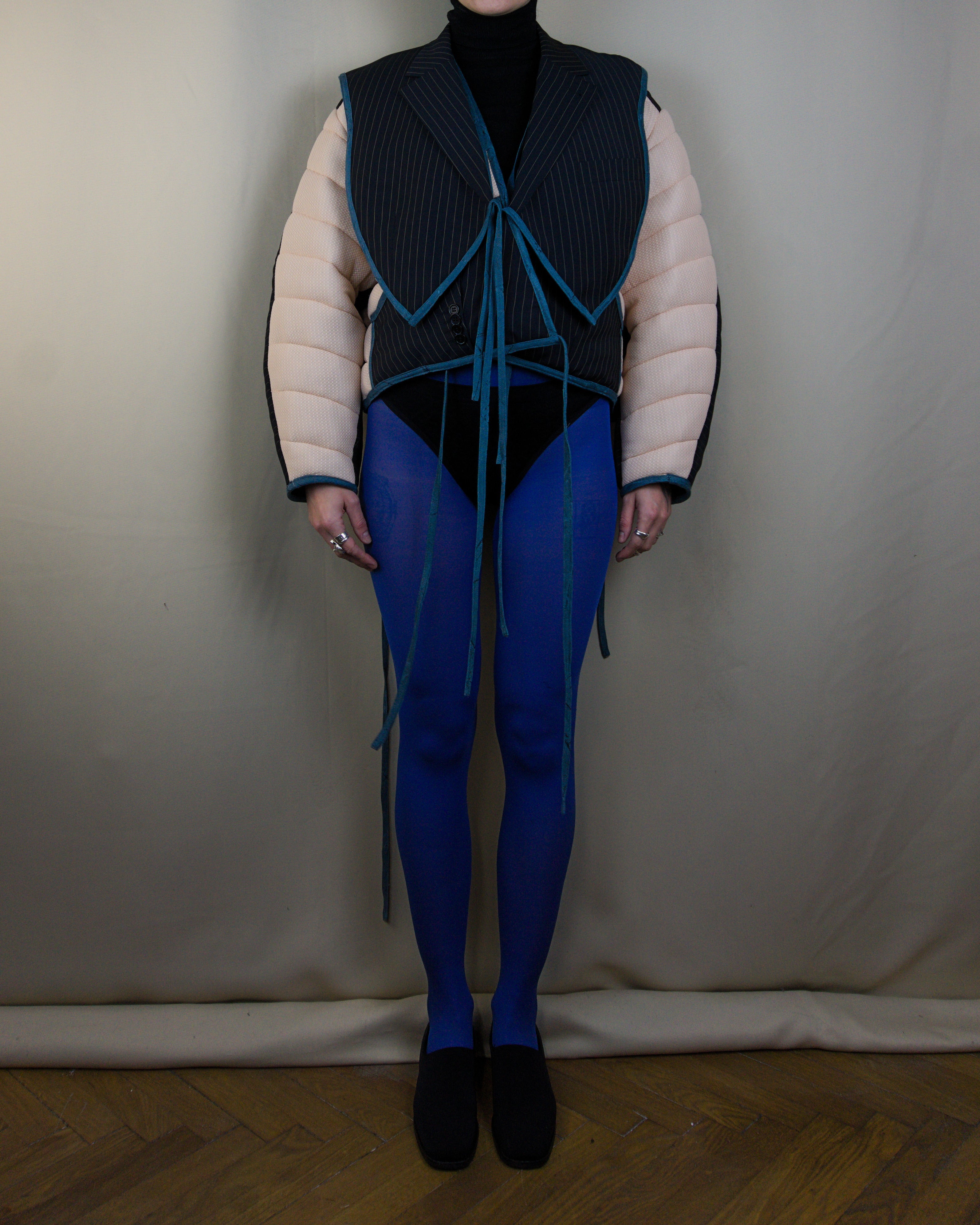 Light pink and black layered puffer jacket