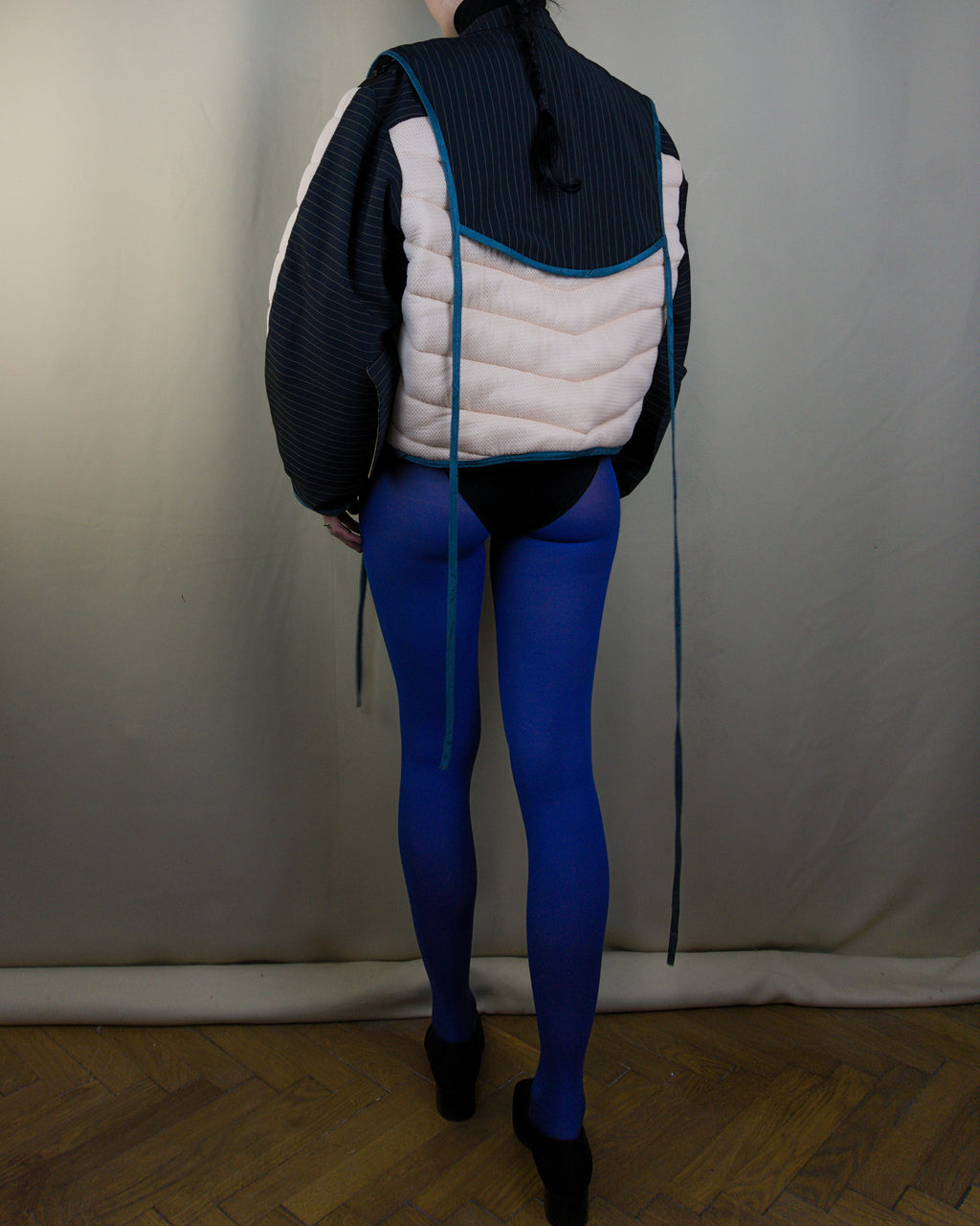 Light pink and black layered puffer jacket