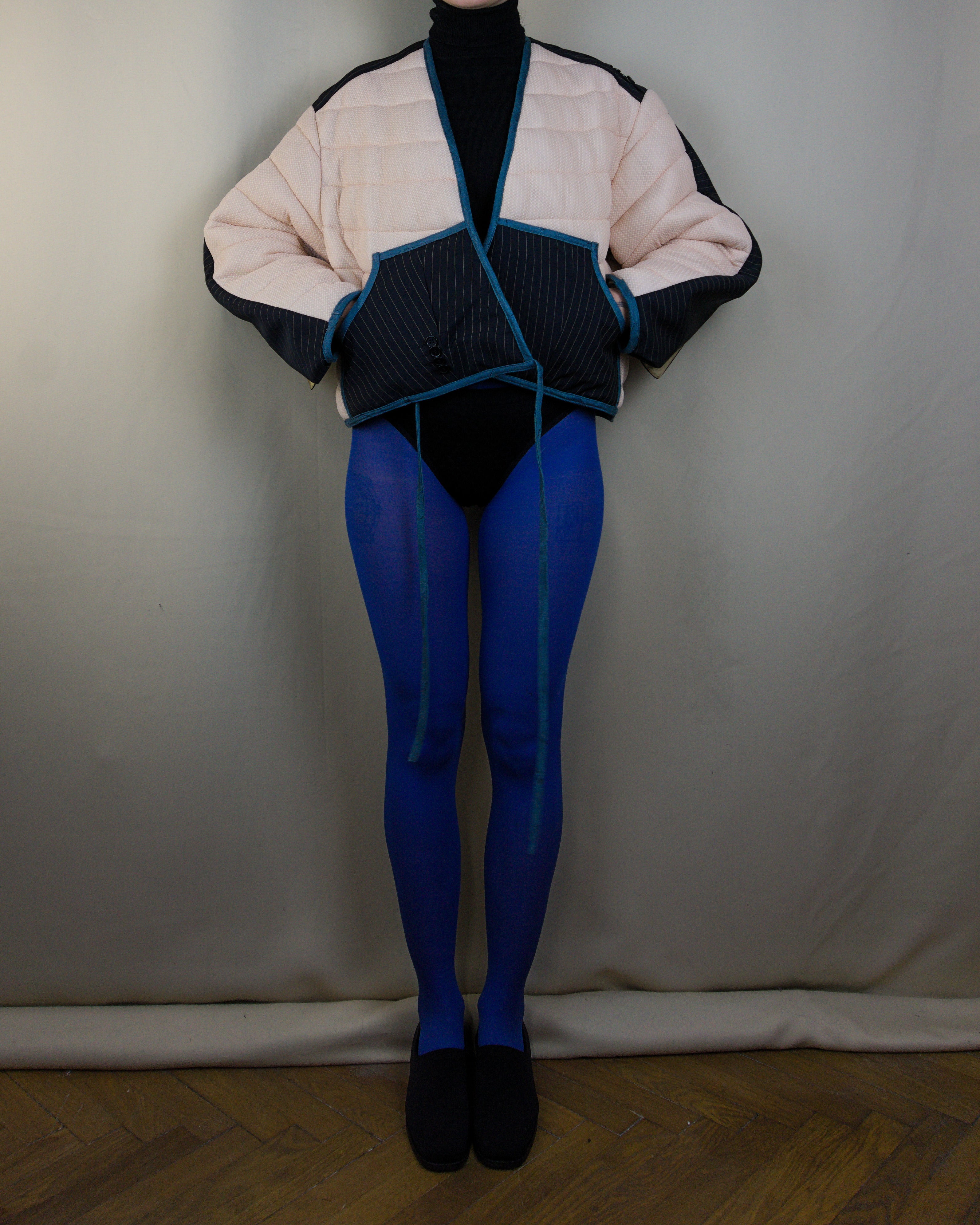 Light pink and black layered puffer jacket