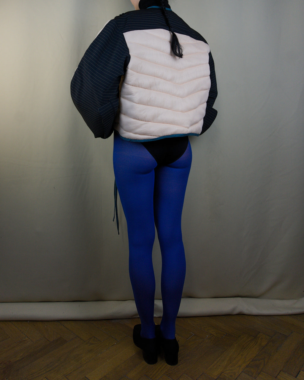 Light pink and black layered puffer jacket