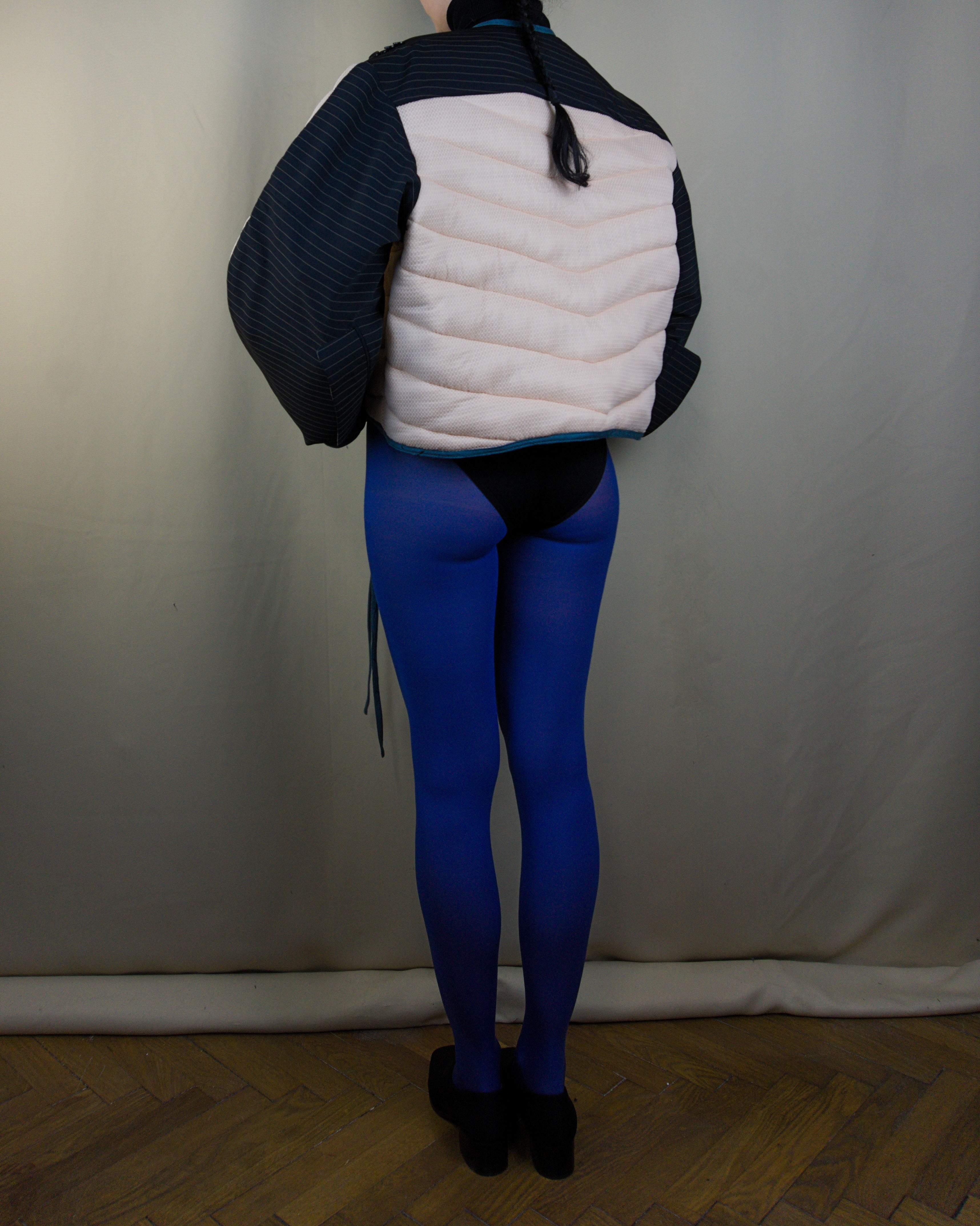 Light pink and black layered puffer jacket