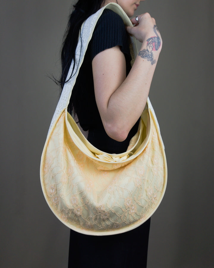 Lace half moon handbag