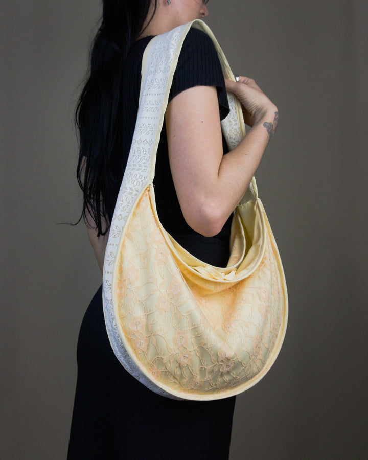 Lace half moon handbag
