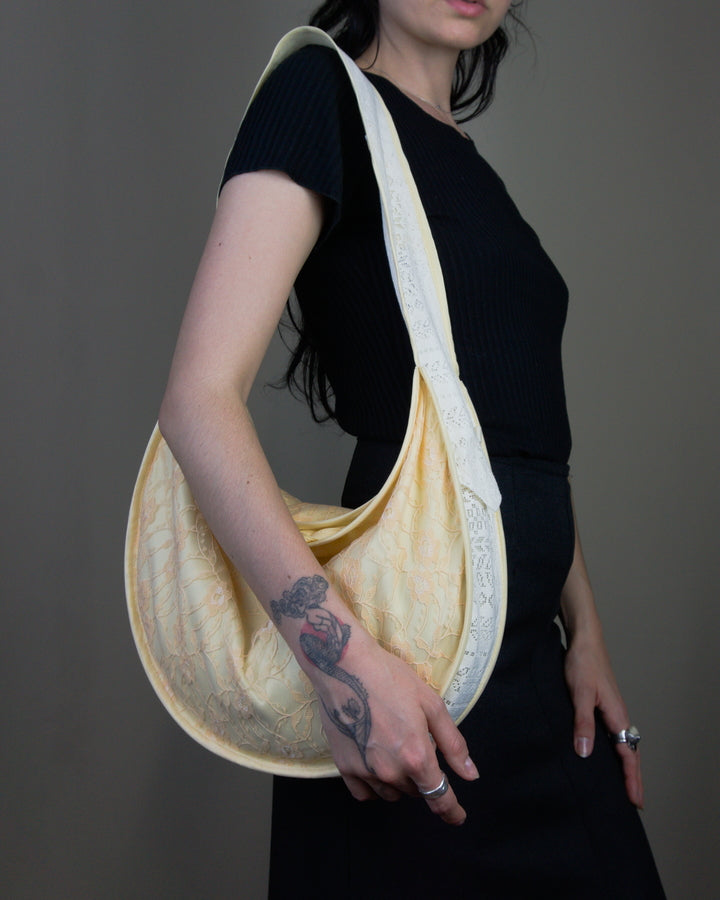 Lace half moon handbag