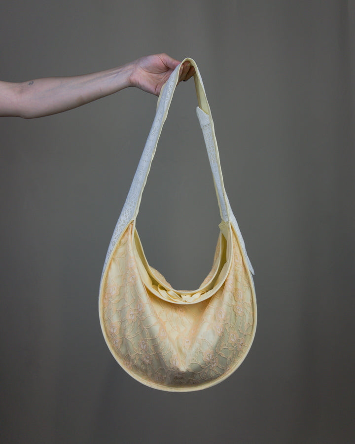 Lace half moon handbag