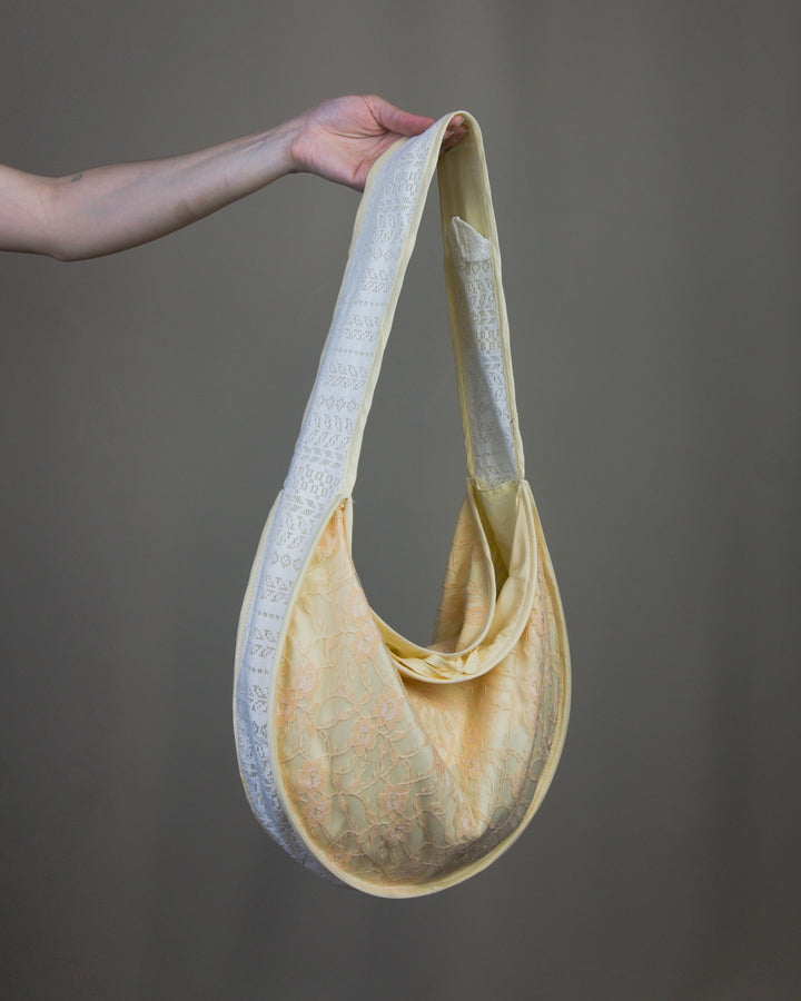 Lace half moon handbag