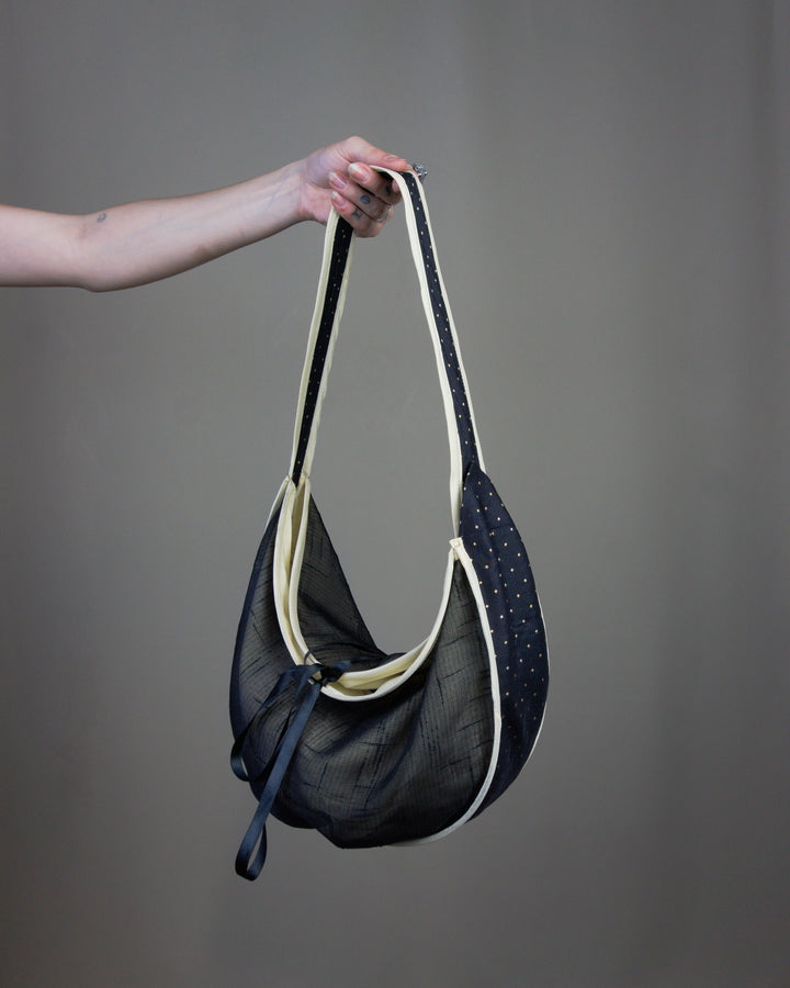 Black half moon handbag