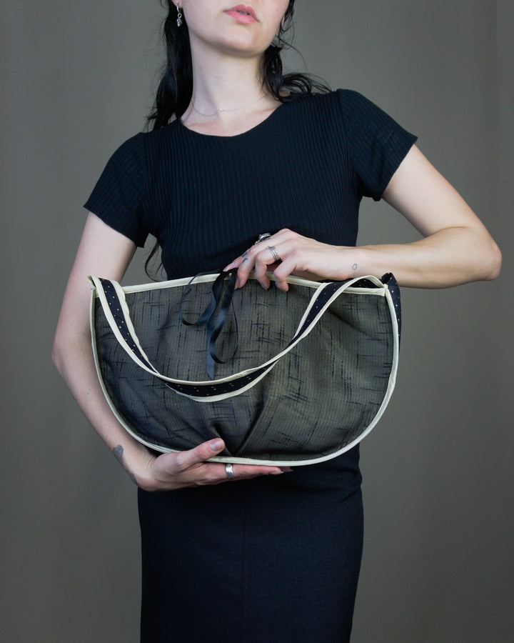 Black half moon handbag