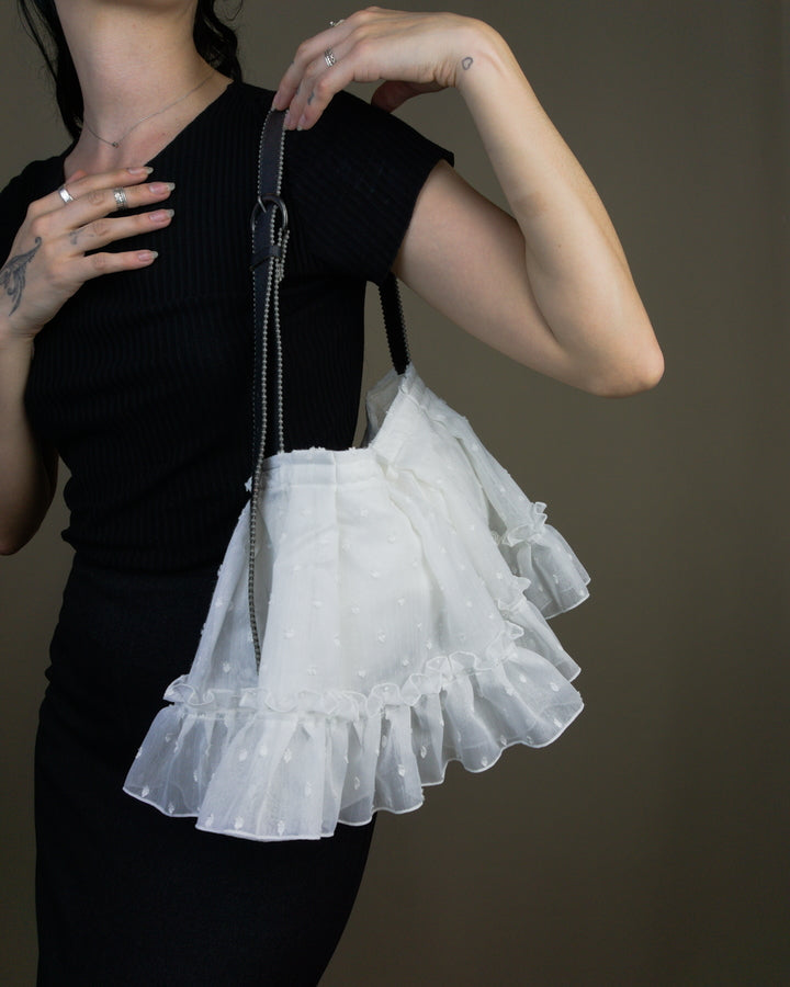 White ruffled bag