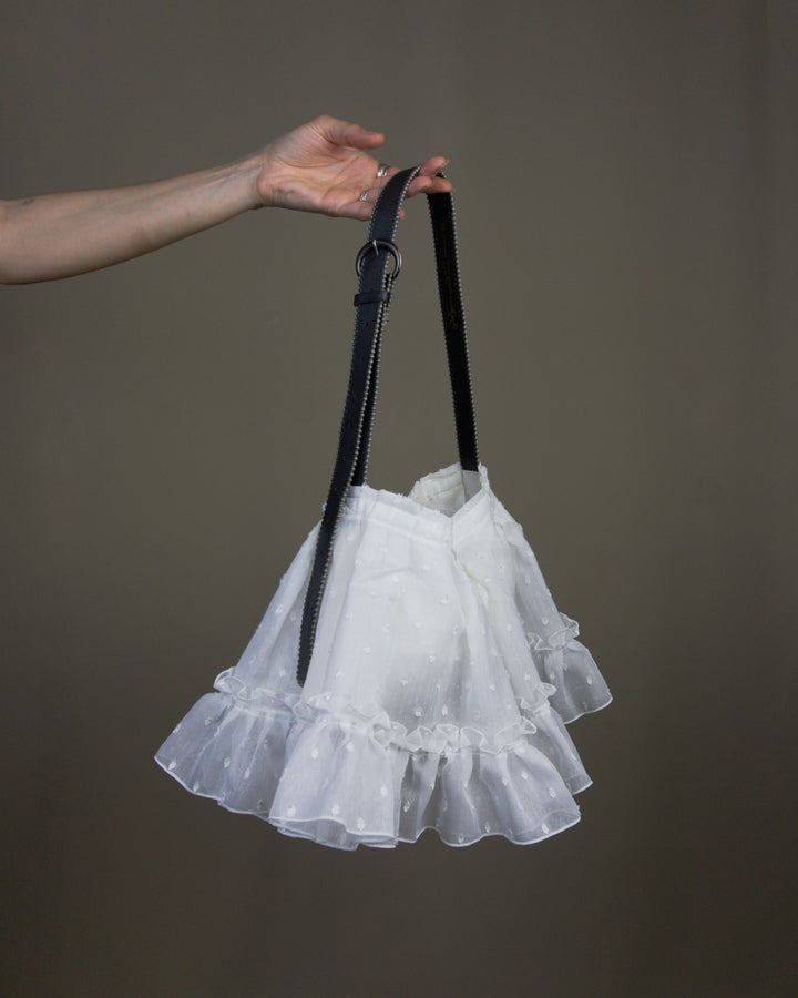 White ruffled bag