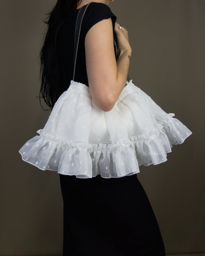 White ruffled bag