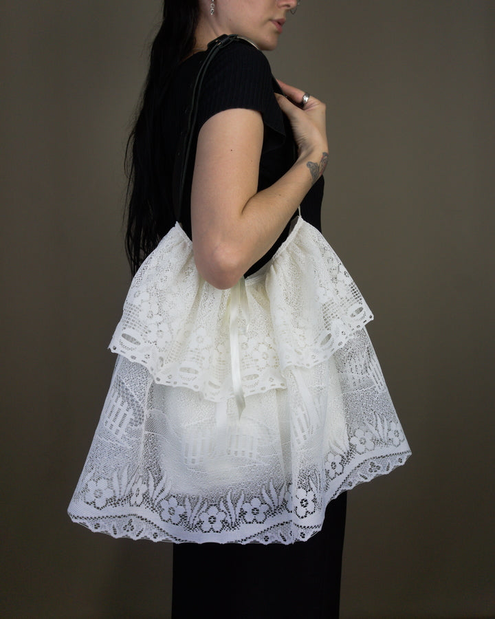 White lace ruffled bag