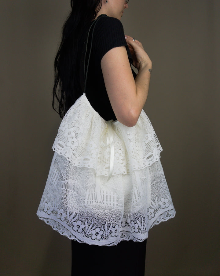White lace ruffled bag