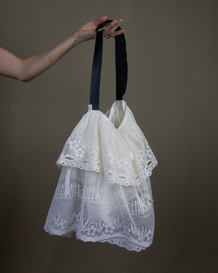 White lace ruffled bag