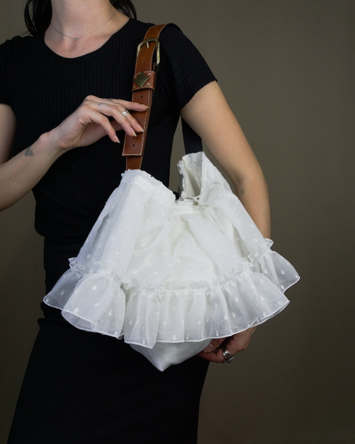 White ruffled bag
