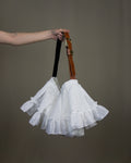 White ruffled bag