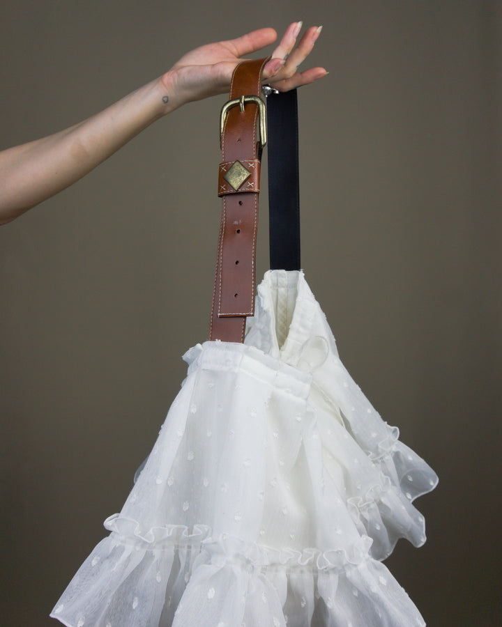 White ruffled bag