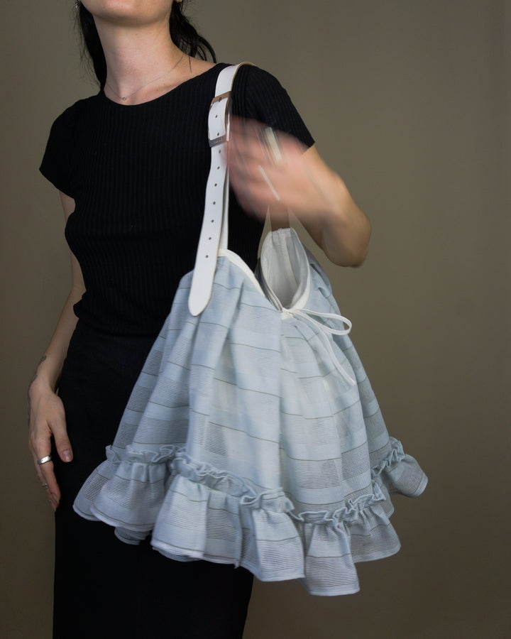 Light blue ruffled bag