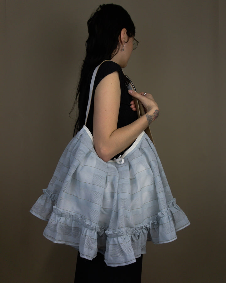 Light blue ruffled bag