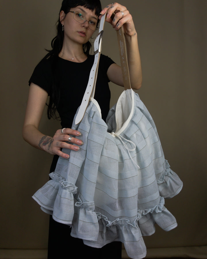 Light blue ruffled bag